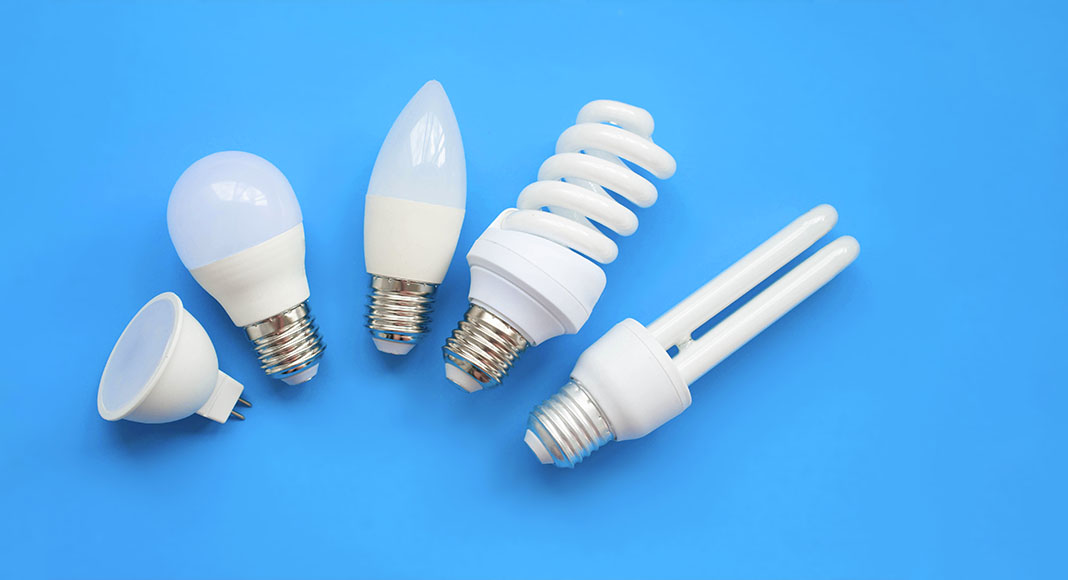 An assortment of light bulbs against a pleasant blue background