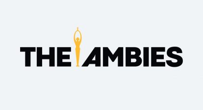 Black text that reads "The Ambies" in all caps, with a gold trophy sandwiched between the words "The" and "Ambies"