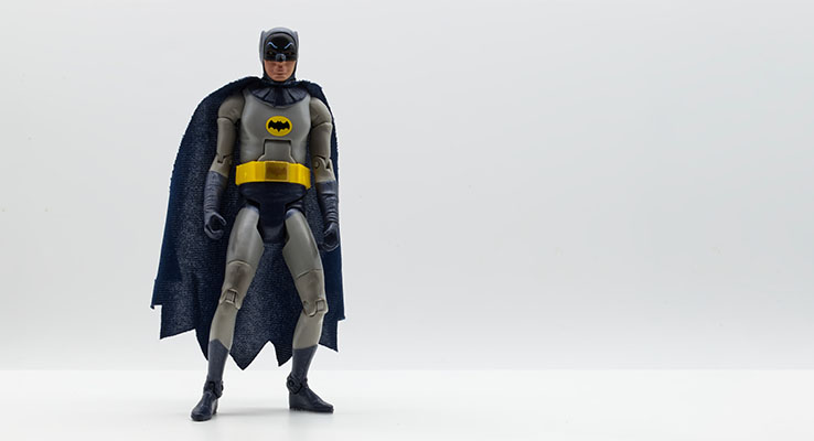 Batman Figurine standing in white background
