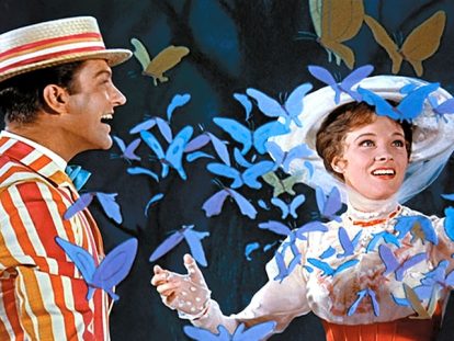 Mary Poppins holds her hands out as blue butterflies fly past her.