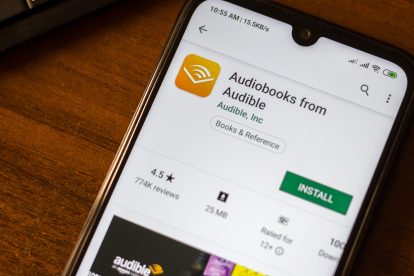 Audiobooks from Audible app on the display of smartphone or tablet.