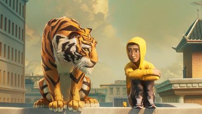 An animate image of a boy in a yellow hoodie and a tiger looking at each other, while sitting on a rooftop.